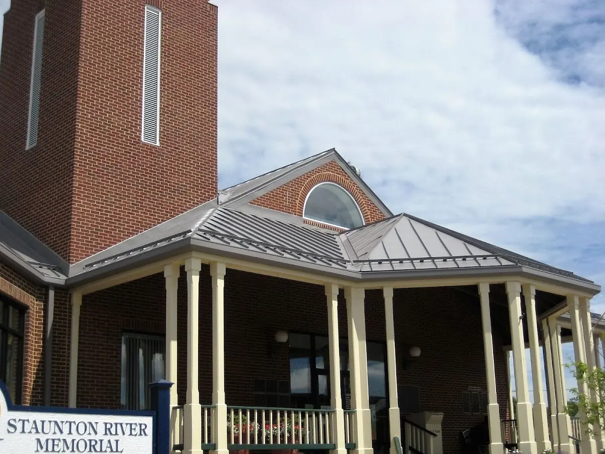 Skilled roofing craftsmen working on a residential roof in Rolling Meadows